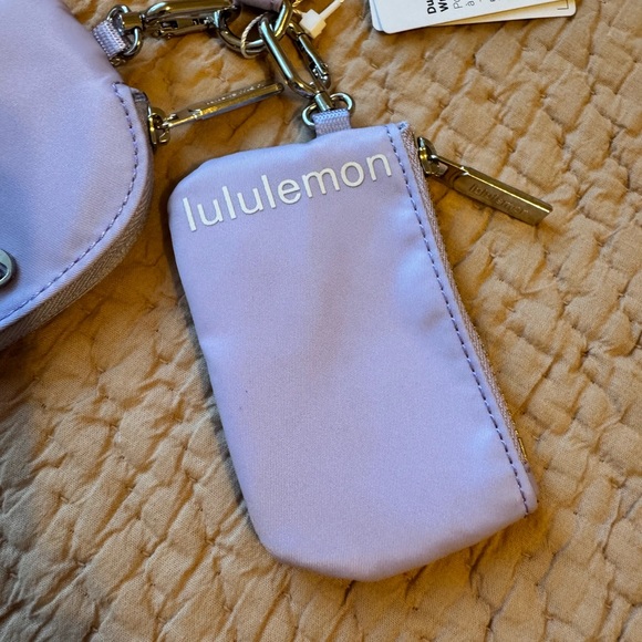 NWT Lululemon Athletica Dual Pouch Wristlet in Lavender Frost/White, Silver - Picture 3 of 10